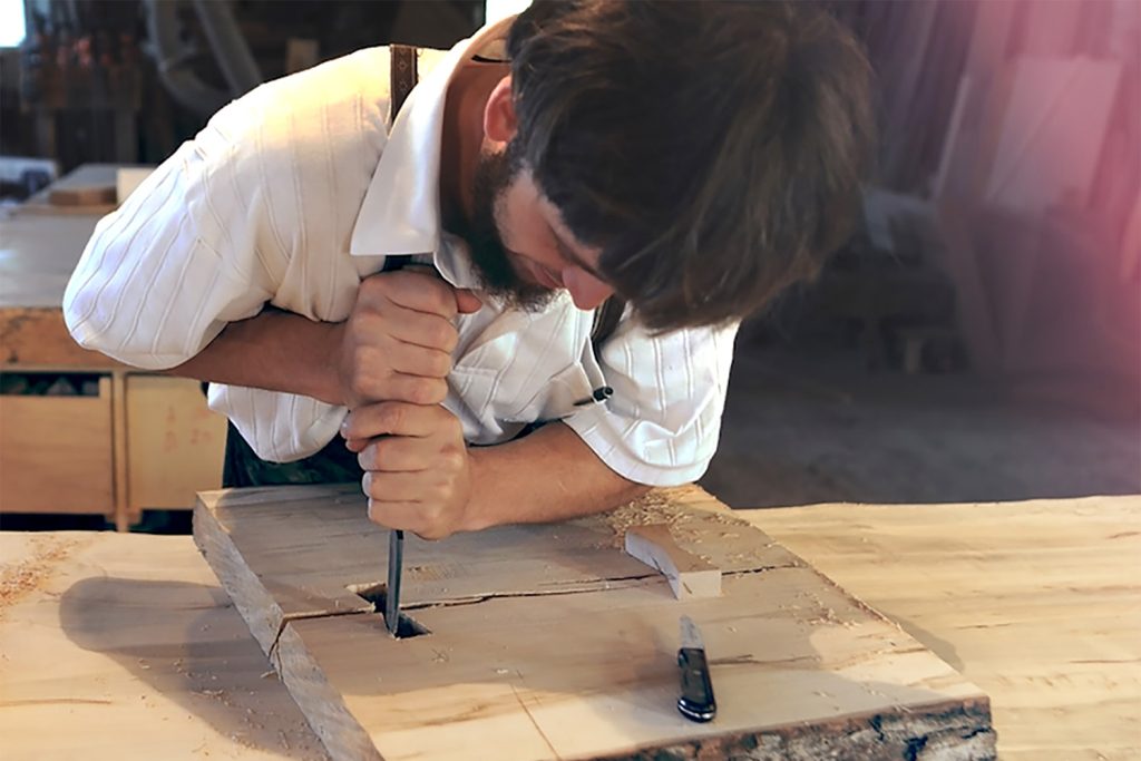 Volunteer organizes our race expo, and is a skilled craftsmen himself